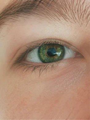Eclat Soin 3-in-1 Eye Cream for Men with Cannabidiol & Hemp Seed Oil shown near a model's eye